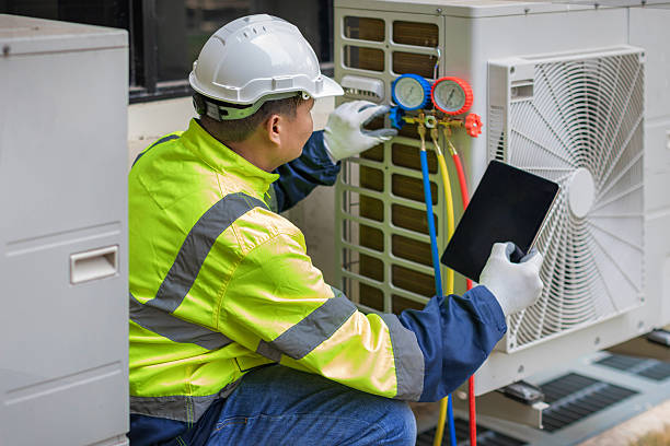 Professional Hvac technician working in Hollis, OK